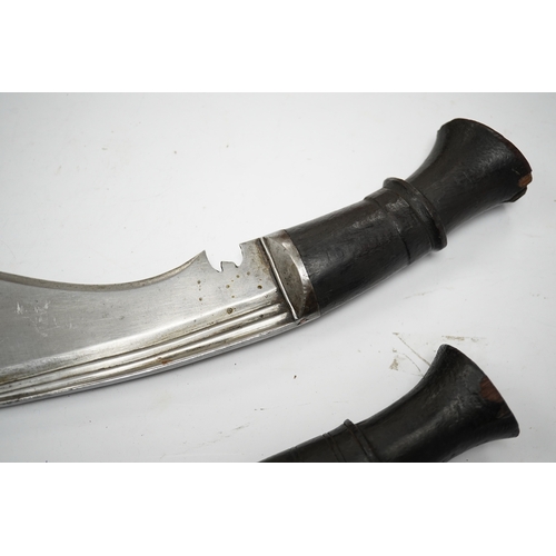 273 - Two military kukri; one with blade stamped with British government ownership mark and issue date Feb... 