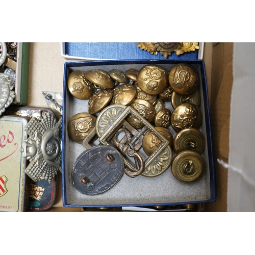 276 - A collection of military medals, cap badges and buttons etc. including; a First World War Royal Navy... 