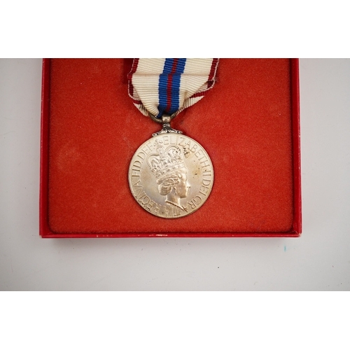 283 - A collection of medal related items, etc., including; a Belgium Albert I commemorative medal,a cased... 