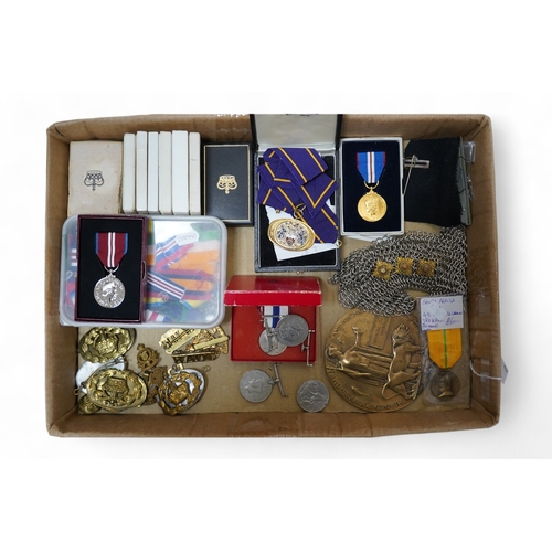 283 - A collection of medal related items, etc., including; a Belgium Albert I commemorative medal,a cased... 