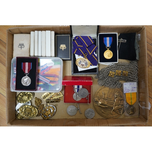 283 - A collection of medal related items, etc., including; a Belgium Albert I commemorative medal,a cased... 