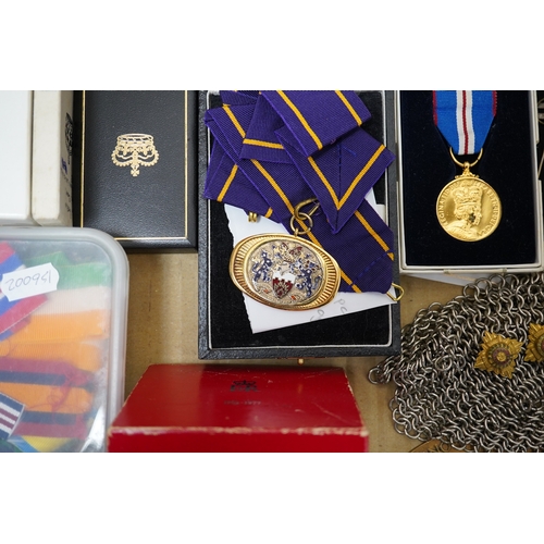 283 - A collection of medal related items, etc., including; a Belgium Albert I commemorative medal,a cased... 