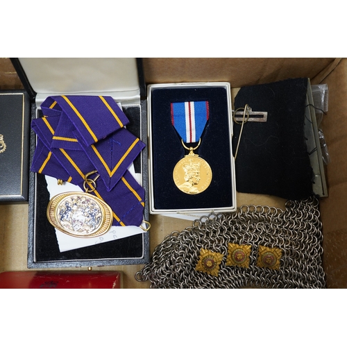 283 - A collection of medal related items, etc., including; a Belgium Albert I commemorative medal,a cased... 