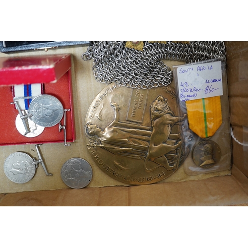 283 - A collection of medal related items, etc., including; a Belgium Albert I commemorative medal,a cased... 