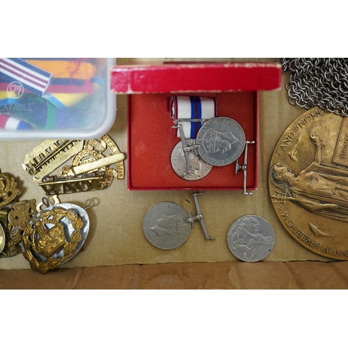 283 - A collection of medal related items, etc., including; a Belgium Albert I commemorative medal,a cased... 