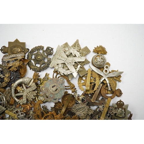 286 - Sixty military cap badges, including; the Hampshire regiment, the South Lancashire Regiment, Prince ... 