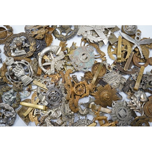 286 - Sixty military cap badges, including; the Hampshire regiment, the South Lancashire Regiment, Prince ... 