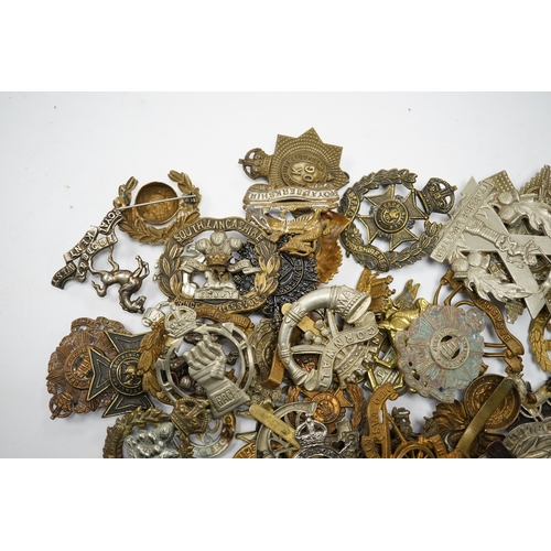 286 - Sixty military cap badges, including; the Hampshire regiment, the South Lancashire Regiment, Prince ... 