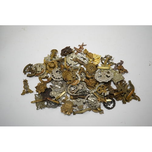 288 - Sixty military cap badges including; the Lancashire Hussars, the Royal Corps of Signals, the Essex R... 