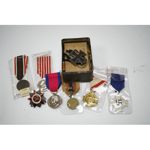 289 - Fifteen British, German, etc. military medals including; a First World War medal pair to DVR. A.E. H... 