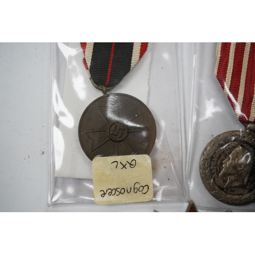 289 - Fifteen British, German, etc. military medals including; a First World War medal pair to DVR. A.E. H... 