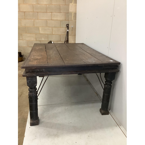 29 - An Indian iron studded hardwood dining table, width 176cm, depth 116cm, height 78cm. Condition - fai... 