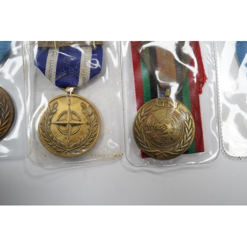 290 - Thirteen United Nations (UN) and NATO medals, eleven UN examples with  in the service of peace to ... 