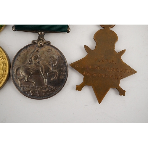 299 - A First World War medal trio and Naval Reserve Long Service medal awarded to R.E.A. Lawrence ENGN RN... 