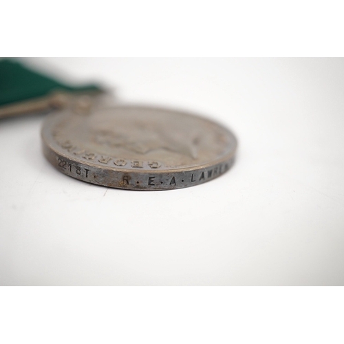 299 - A First World War medal trio and Naval Reserve Long Service medal awarded to R.E.A. Lawrence ENGN RN... 