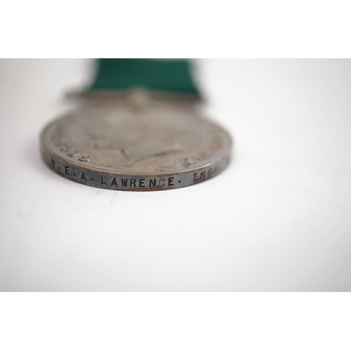 299 - A First World War medal trio and Naval Reserve Long Service medal awarded to R.E.A. Lawrence ENGN RN... 