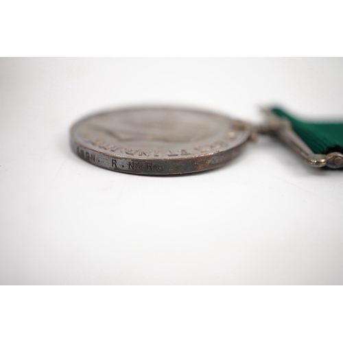 299 - A First World War medal trio and Naval Reserve Long Service medal awarded to R.E.A. Lawrence ENGN RN... 