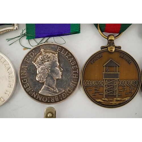 300 - Five medals including three ERII General Service Medals; a medal for Malaya awarded to T/23354816 DV... 