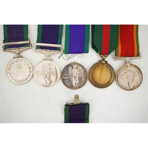 300 - Five medals including three ERII General Service Medals; a medal for Malaya awarded to T/23354816 DV... 