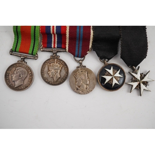 301 - A WWII and later medal group of five medals, together with its miniature set, comprising; The Defenc... 