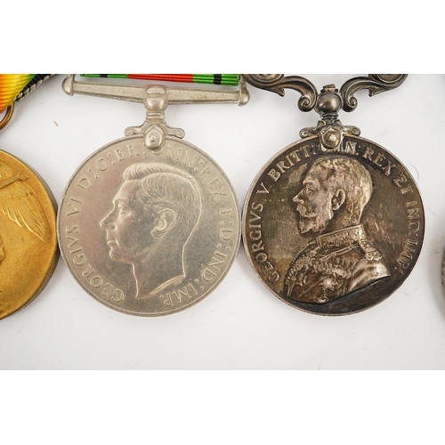 302 - A medal group comprising of a Meritorious Service medal, a 1939 to 1945 Defence Medal, and a First W... 