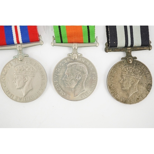 303 - Seven WWII medals and stars; The Africa star, with a clasp for 1st Army,The Atlantic star, with a cl... 