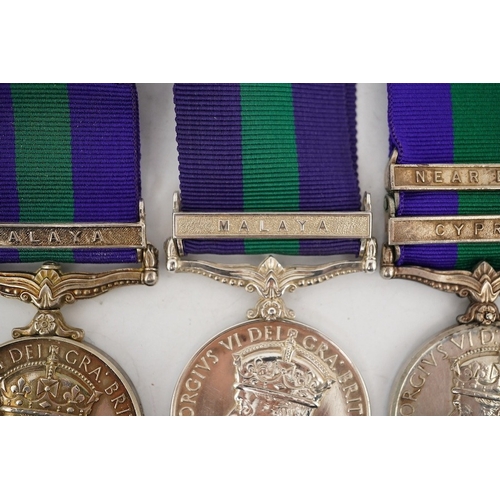 306 - Four George VI General Service Medals; a medal for Malaya awarded to 2433587 S.A.C. R. Bennett. R.A.... 