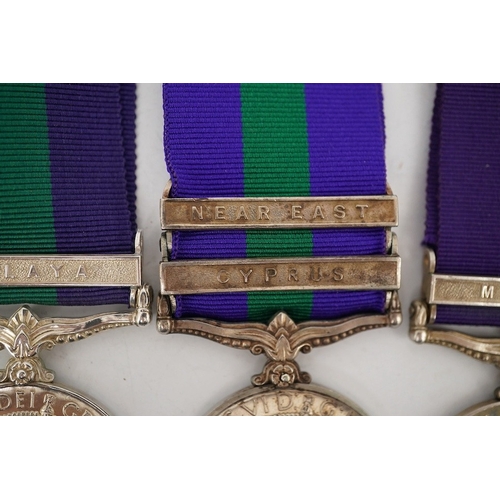 306 - Four George VI General Service Medals; a medal for Malaya awarded to 2433587 S.A.C. R. Bennett. R.A.... 