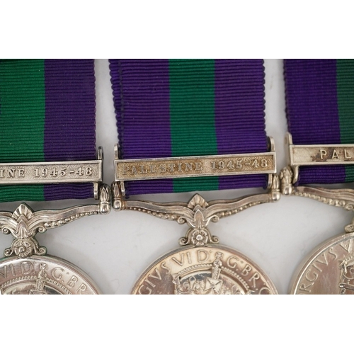 309 - Four George VI General Service Medals; a medal for Palestine awarded to 527328 A.C.I. R.A. Jones R.A... 