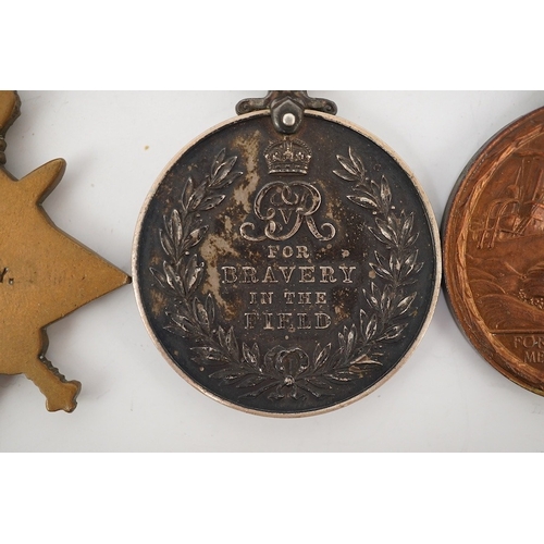 312 - Seven First World War medals, including a Military Medal (MM) group comprising of an MMand a 1914 St... 