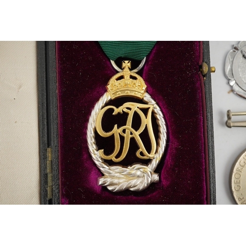 314 - A WWII Defence medal and The France and Germany Star together with a cased Royal Navy Reserve Decora... 