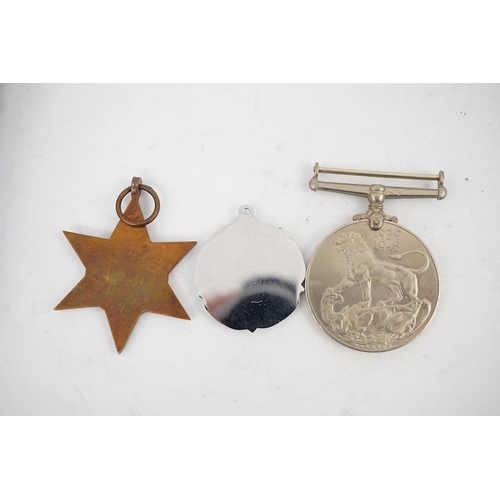 314 - A WWII Defence medal and The France and Germany Star together with a cased Royal Navy Reserve Decora... 