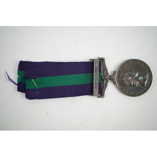 321 - An ERII General Service medal, awarded to 14473980 SGT. D.W. Tedder. R.A., with a clasp for Cyprus. ... 