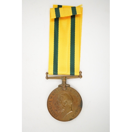 324 - A George V Territorial Force War Medal 1914-19, unnamed. Condition - fair.