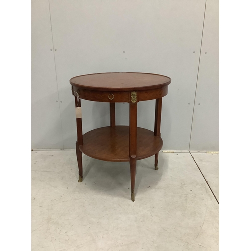 33 - A French transitional style gilt metal mounted circular two tier occasional table, diameter 66cm, he... 