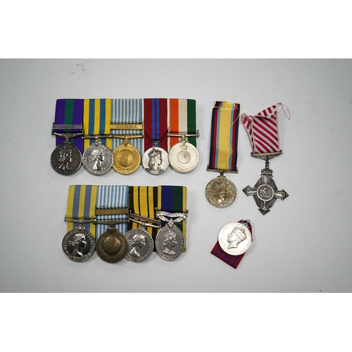 330 - Twelve ERII and George VI medals, some medals arranged into two medals groups (containing unnamed me... 