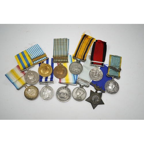 331 - Eleven military medals, most are replica examples, etc. including; a reproduction Natal Rebellion Me... 