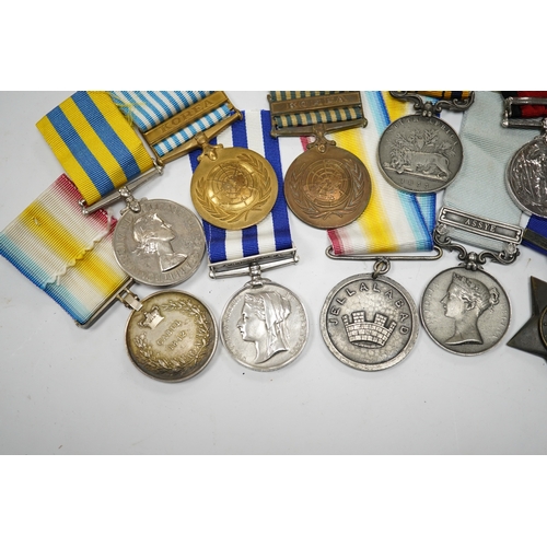 331 - Eleven military medals, most are replica examples, etc. including; a reproduction Natal Rebellion Me... 