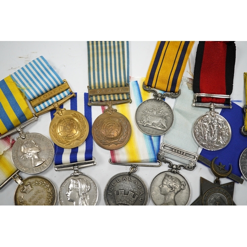 331 - Eleven military medals, most are replica examples, etc. including; a reproduction Natal Rebellion Me... 