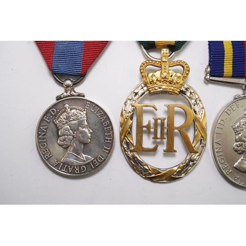 334 - Four ERII service medals; Imperial Service medal to Alexander Manuel, another to Sydney John Jeffery... 