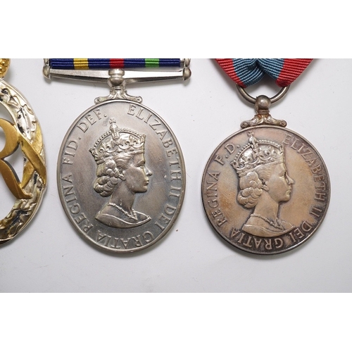 334 - Four ERII service medals; Imperial Service medal to Alexander Manuel, another to Sydney John Jeffery... 