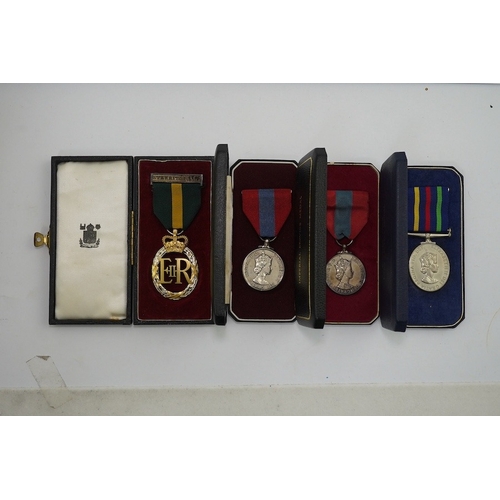 334 - Four ERII service medals; Imperial Service medal to Alexander Manuel, another to Sydney John Jeffery... 