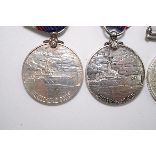 338 - Four assorted Naval service medals; EVII RNRLSGC to 84333 G.Mitchell, Sea'n. 1CL. R.N.R.; GV RFRLSGC... 