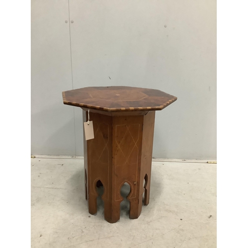 34 - A Moorish style octagonal occasional table, width 48cm, height 57cm. Condition - poor to fair