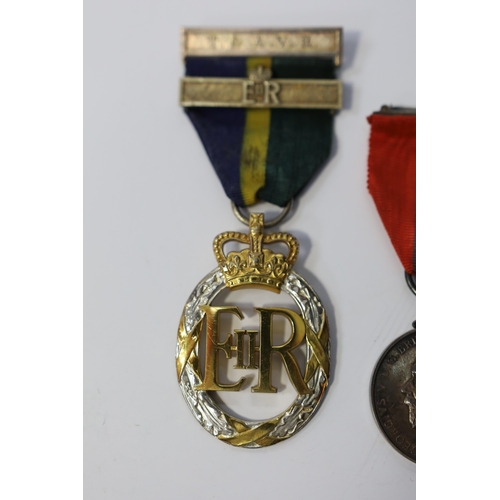 340 - Three assorted service medals; Imperial Service medal to Henry Chillingworth; Territorial Efficiency... 