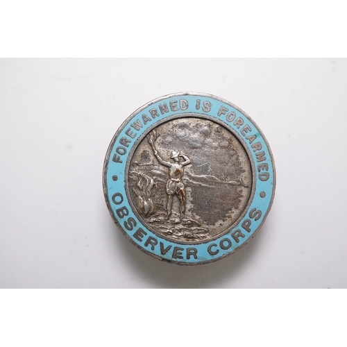 342 - An ERII (B) Royal Observer Corps medal to Observer W.Cook with a lapel badge. Condition - fair.... 