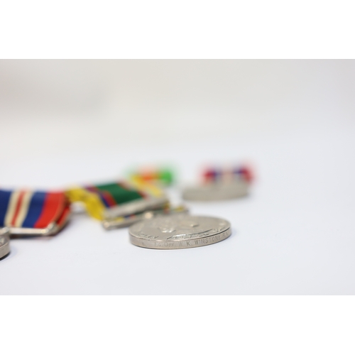 344 - A group of assorted medals; WW2/ERII Cadet Forces medal group of 3  with two clasps to Fg.Off.W.K.Wi... 