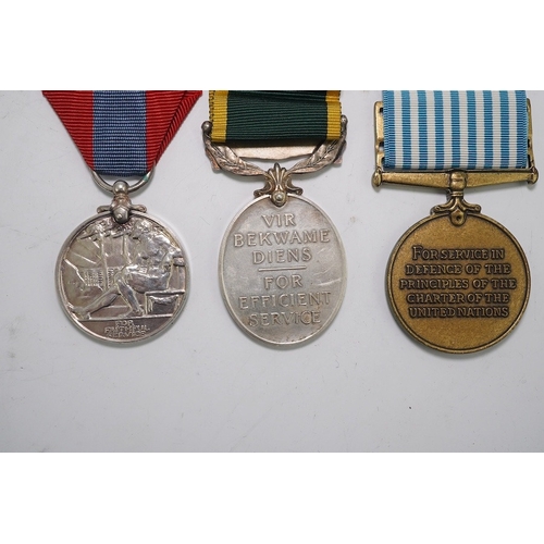 348 - Three assorted medals; GVI (B) Union of South Africa Efficiency medal to S/Sgt.L.Gray S.A.C.S.; GV I... 