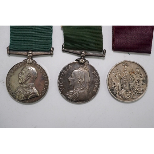 349 - Three LSGC medals; Vict LSGC disc only to 3448 Pens'd Gnr John French Coast Bde R.A.; Vict Volunteer... 