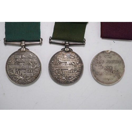 349 - Three LSGC medals; Vict LSGC disc only to 3448 Pens'd Gnr John French Coast Bde R.A.; Vict Volunteer... 